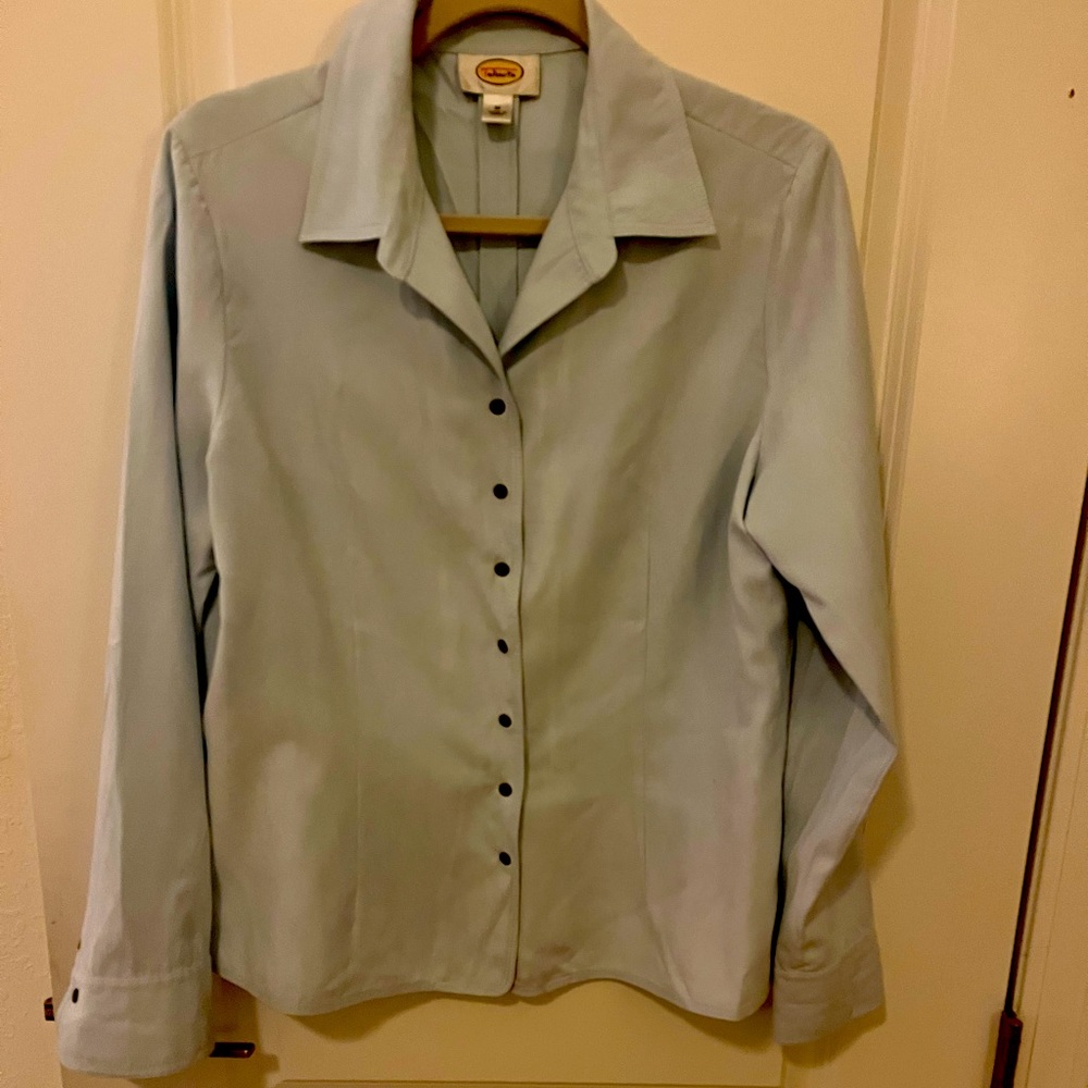 Long sleeved pale blue polyester shirt